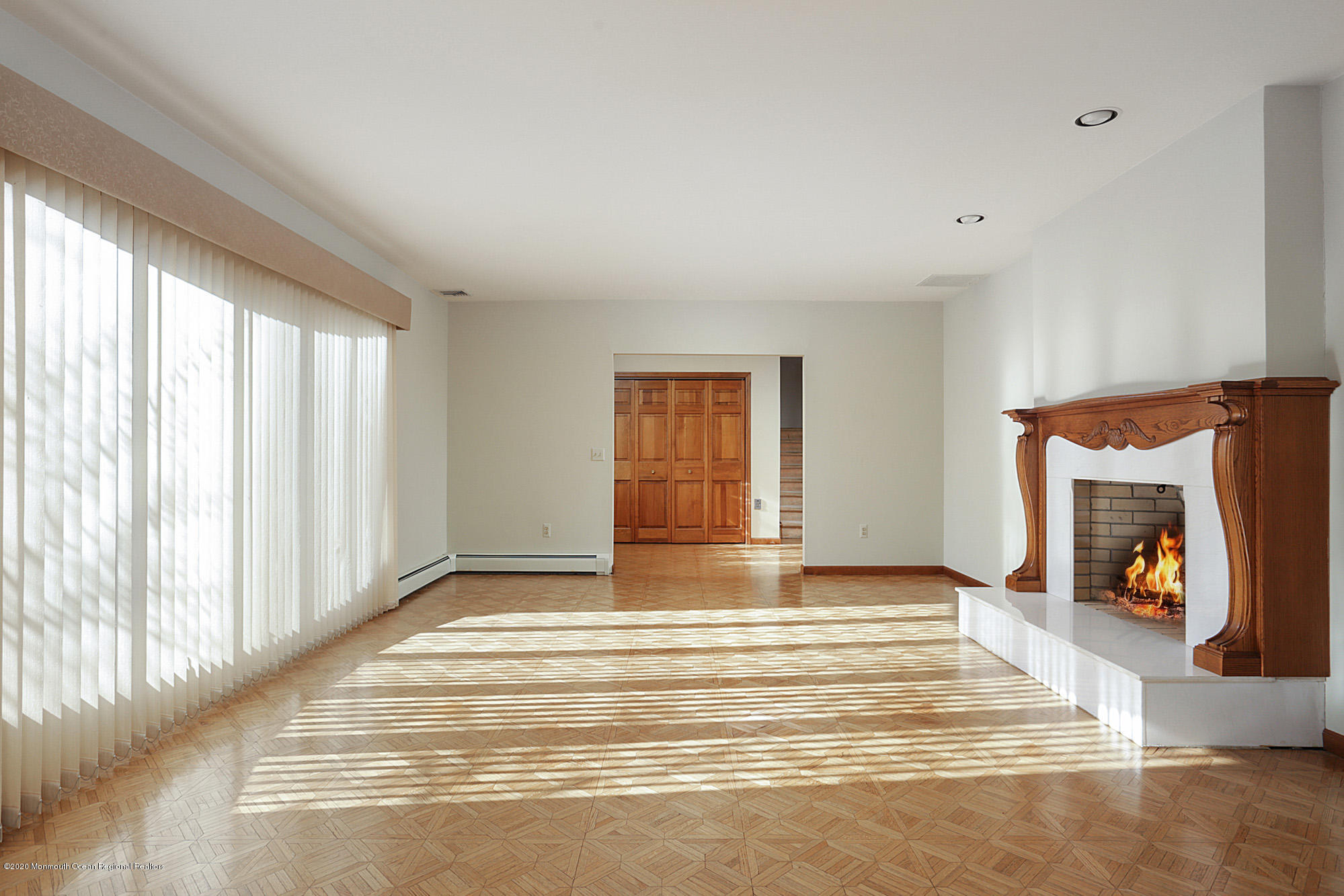 1350 Church Road Toms River, NJ 08755 - Photo 6 of 28 a view of an empty room with window and a fireplace