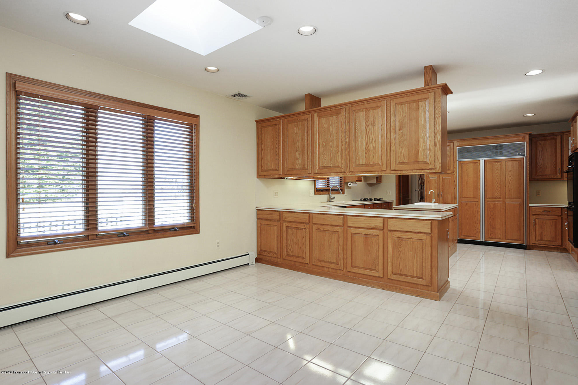 1350 Church Road Toms River, NJ 08755 - Photo 8 of 28 a kitchen with stainless steel appliances granite countertop a stove a sink and a refrigerator