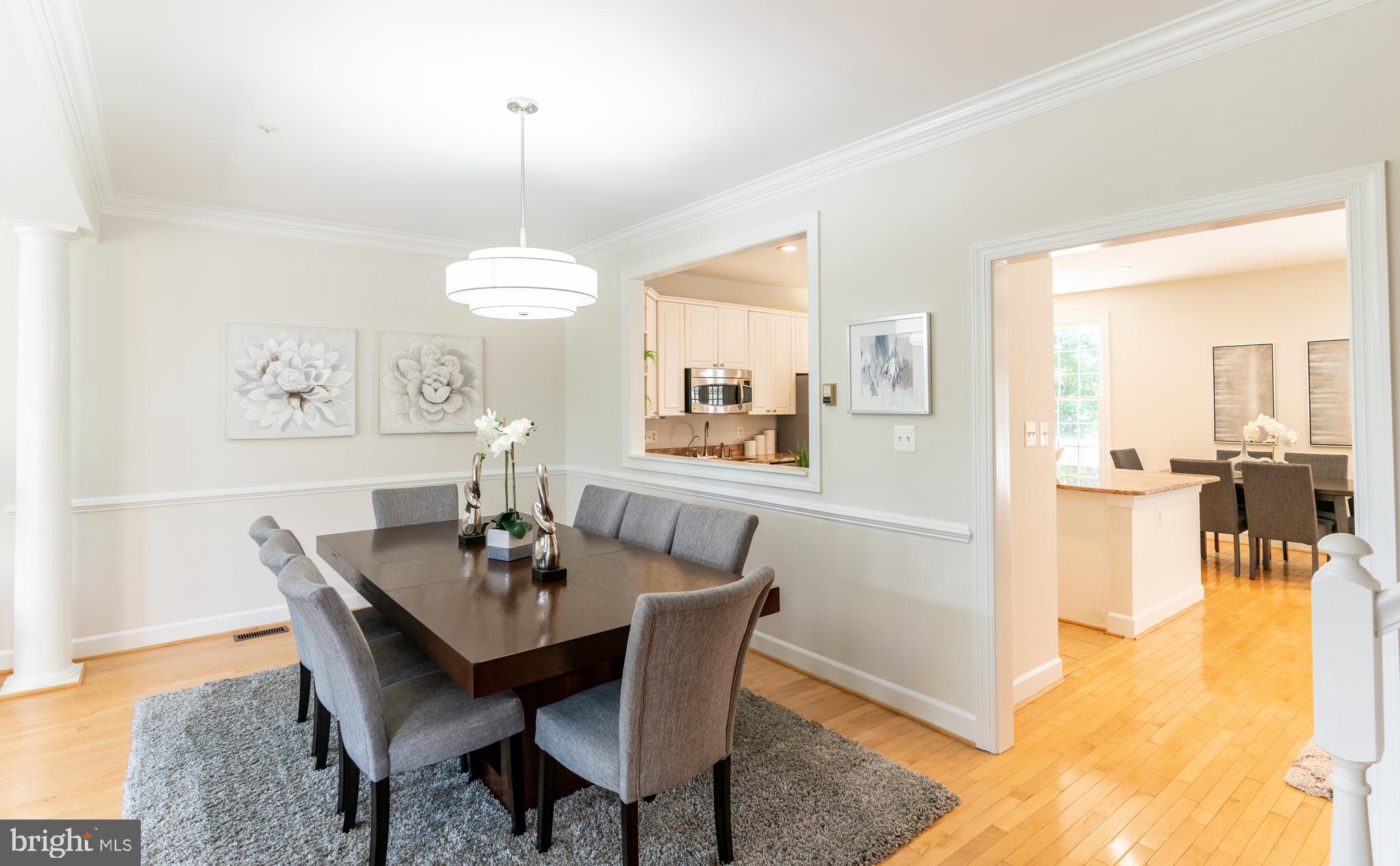 8506 Bells Ridge Terrace Potomac, MD 20854 - Photo 5 of 24 Dining Room opens to kitchen for easy entertaining