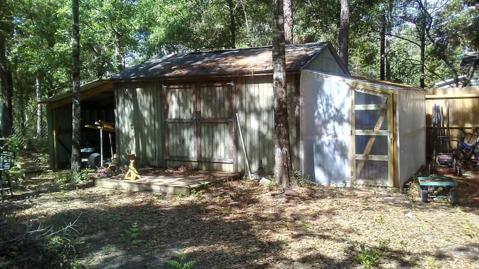 1325 Martin Road DeFuniak Springs, FL 32433 - Photo 12 of 13 Rear Shed and Hot House Weekley