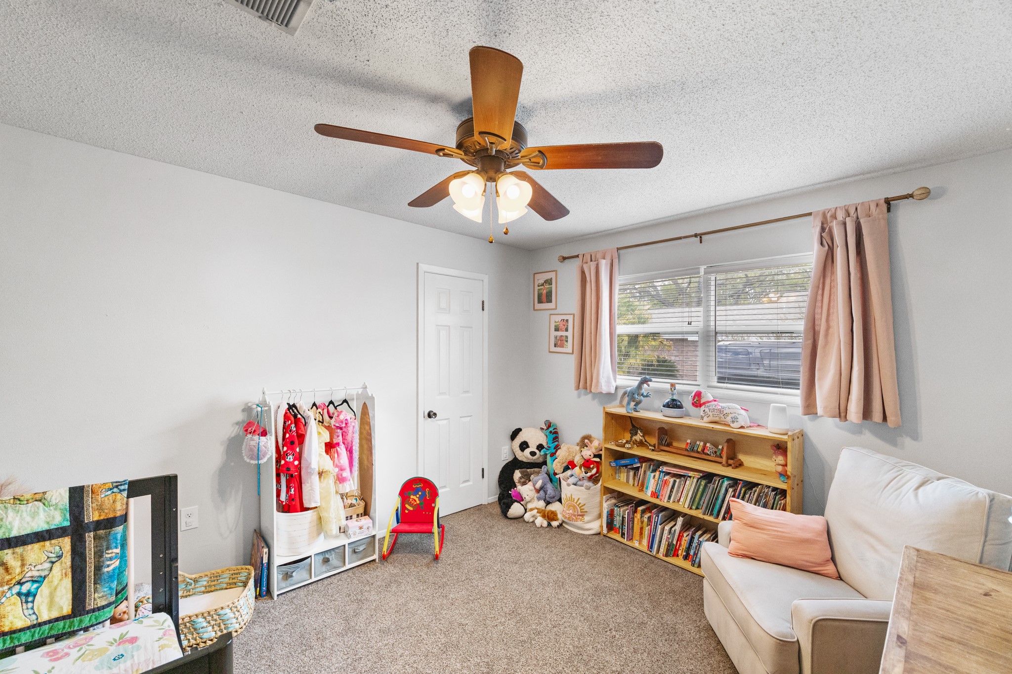 1003 Virginia Street Edna, TX 77957 - Photo 16 of 30 a bedroom with furniture and a window