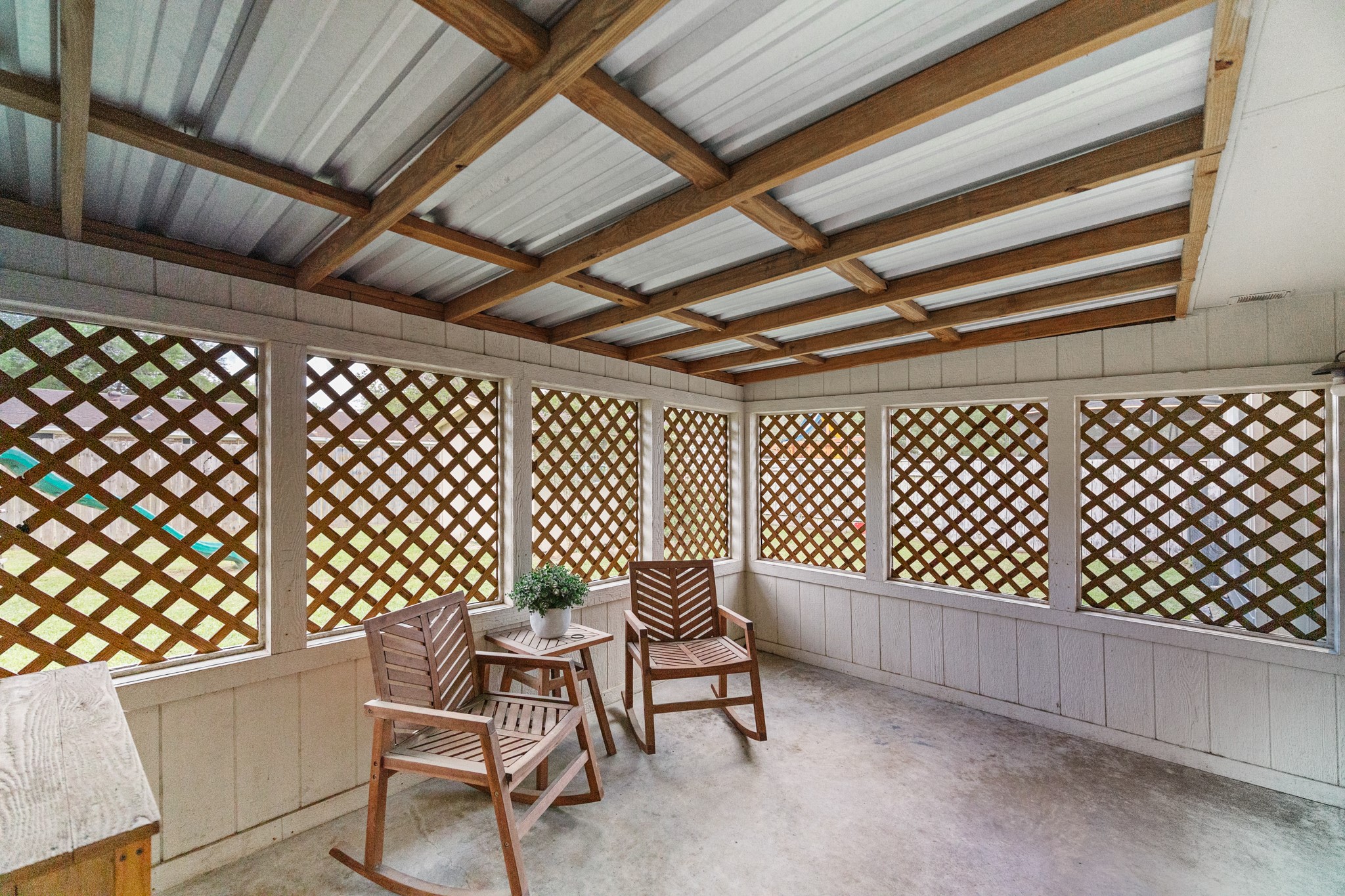 1003 Virginia Street Edna, TX 77957 - Photo 23 of 30 a chair and a table in a room