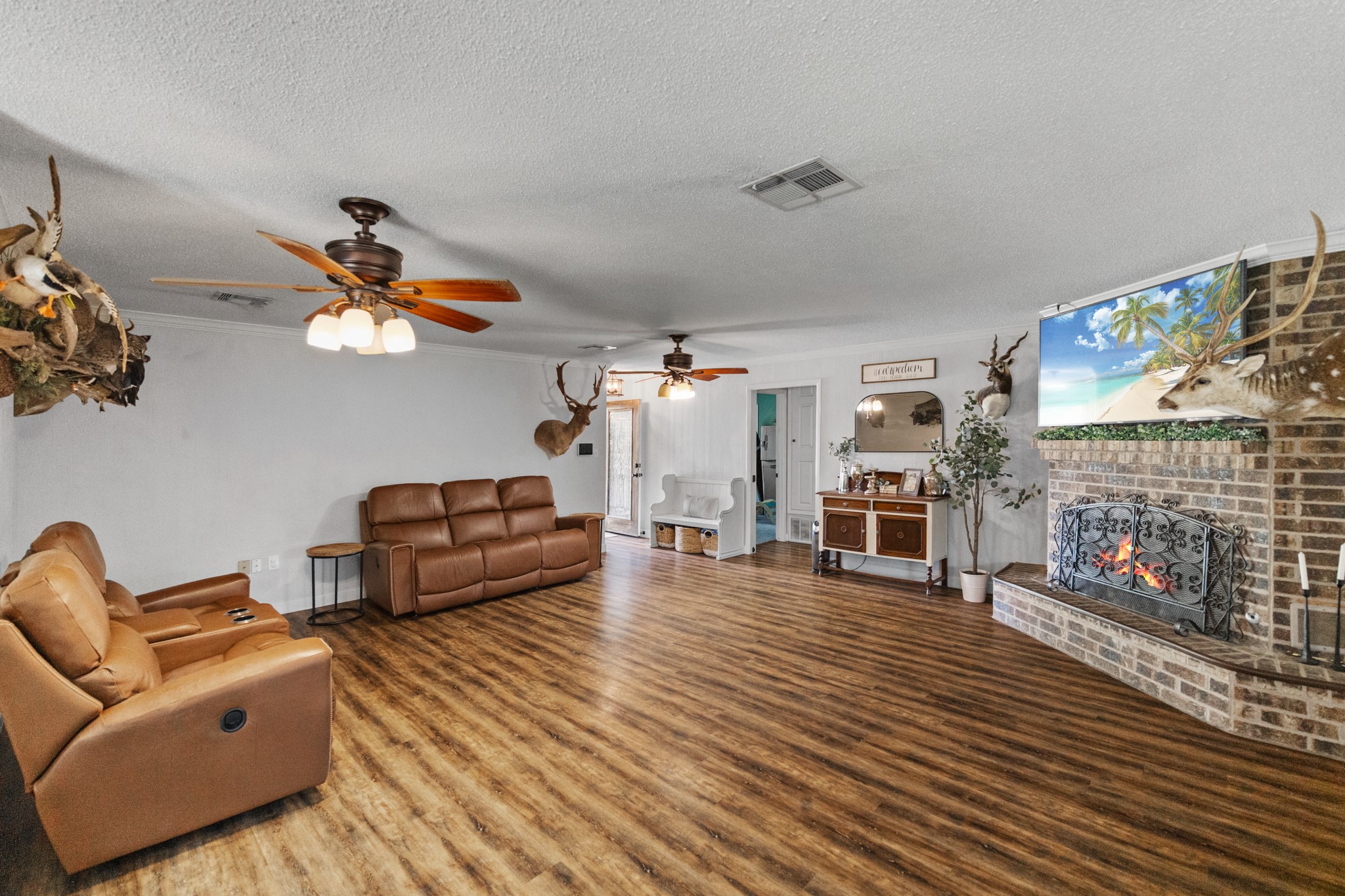 1003 Virginia Street Edna, TX 77957 - Photo 4 of 30 a living room with furniture and fireplace