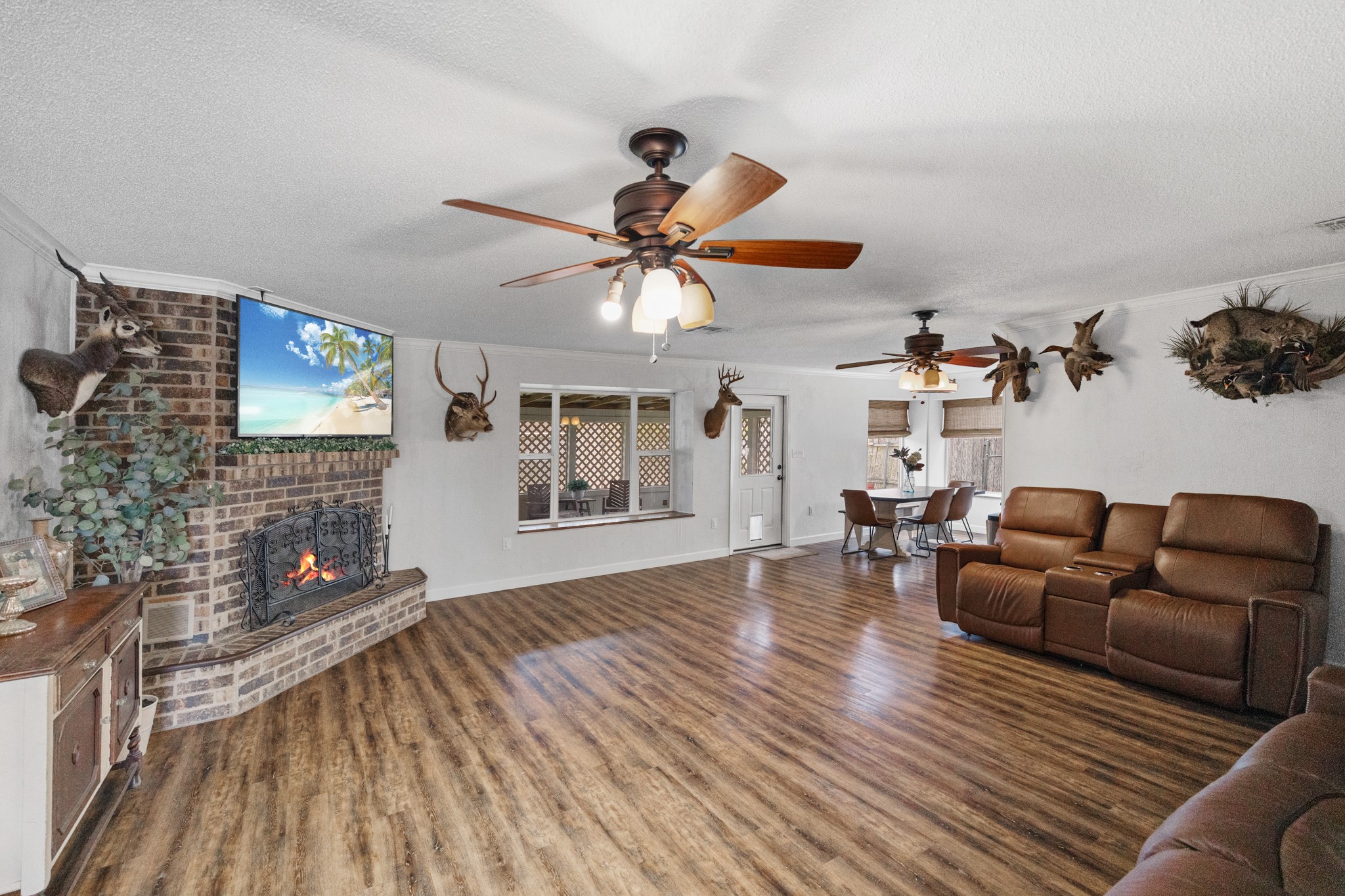 1003 Virginia Street Edna, TX 77957 - Photo 30 of 30 a living room with furniture and a fireplace