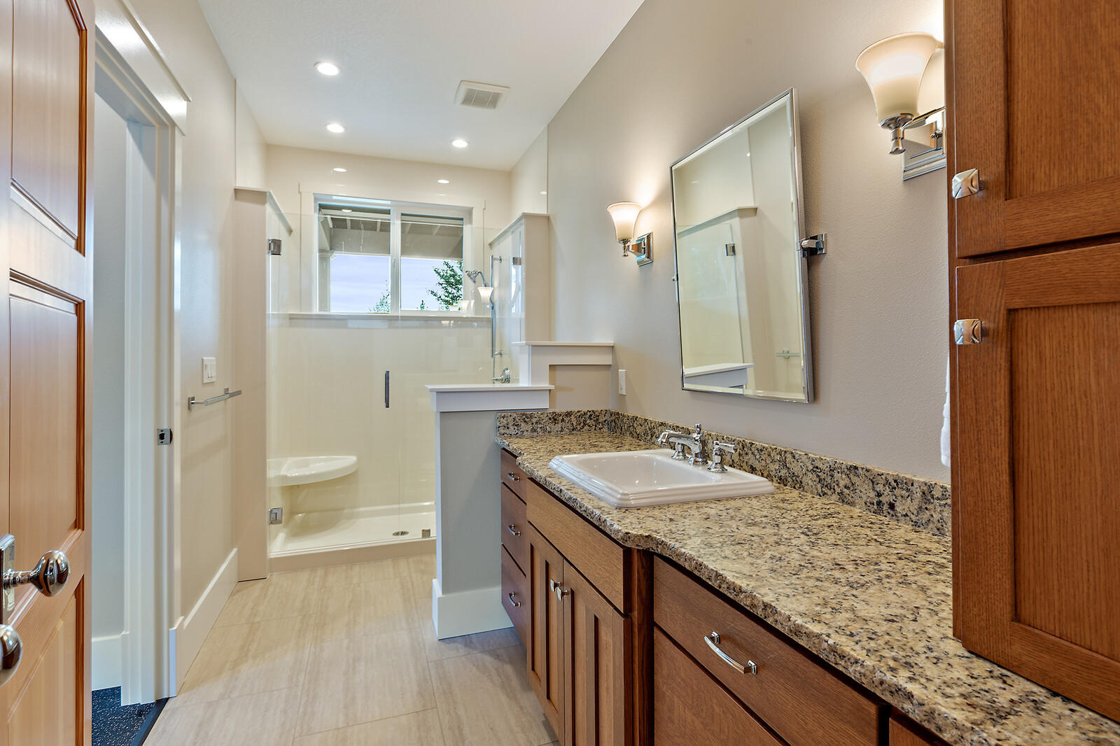 1882 Stewart Road Grants Pass, OR 97526 - Photo 36 of 44 a bathroom with a granite countertop sink and a mirror