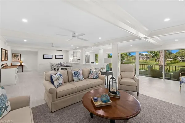 $495,000 | 104 Wilderness Drive, Unit J239, Naples, FL 34105