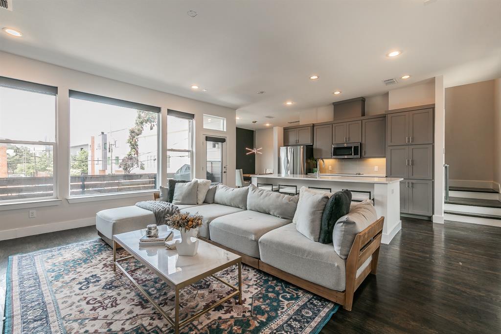 2441 Thatcher Drive Dallas, TX 75206 - Photo 14 of 35 a living room with furniture and a large window