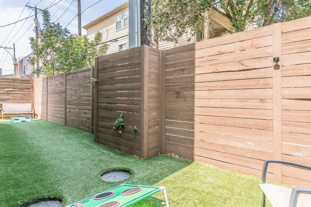 2441 Thatcher Drive Dallas, TX 75206 - Photo 30 of 35 a view of wooden door and a yard