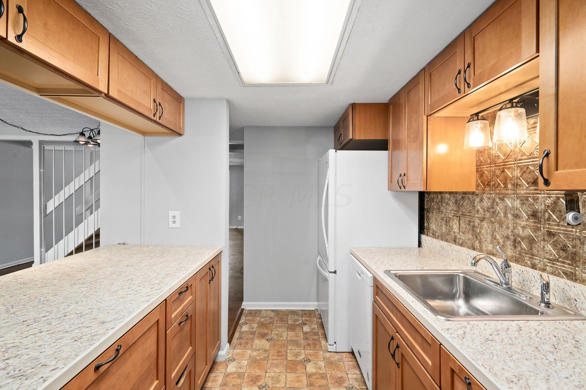 5123 Ranstead Court Columbus, OH 43220 - Photo 18 of 48 lots of light - lots of cabinets and lots of countertop