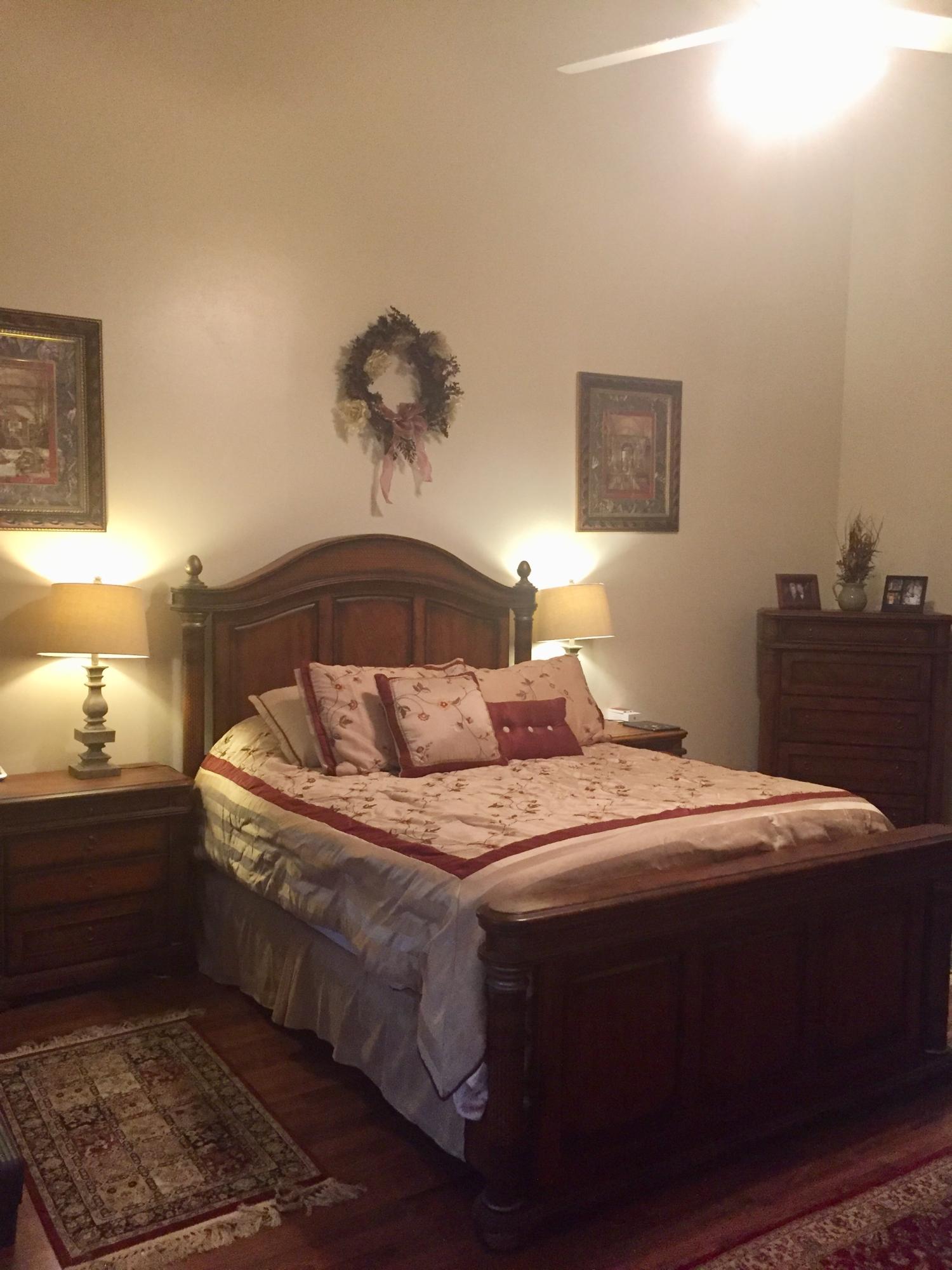 8349 Horseshoe Bay Road Boynton Beach, FL 33472 - Photo 11 of 20 a bedroom with a bed and a cabinets