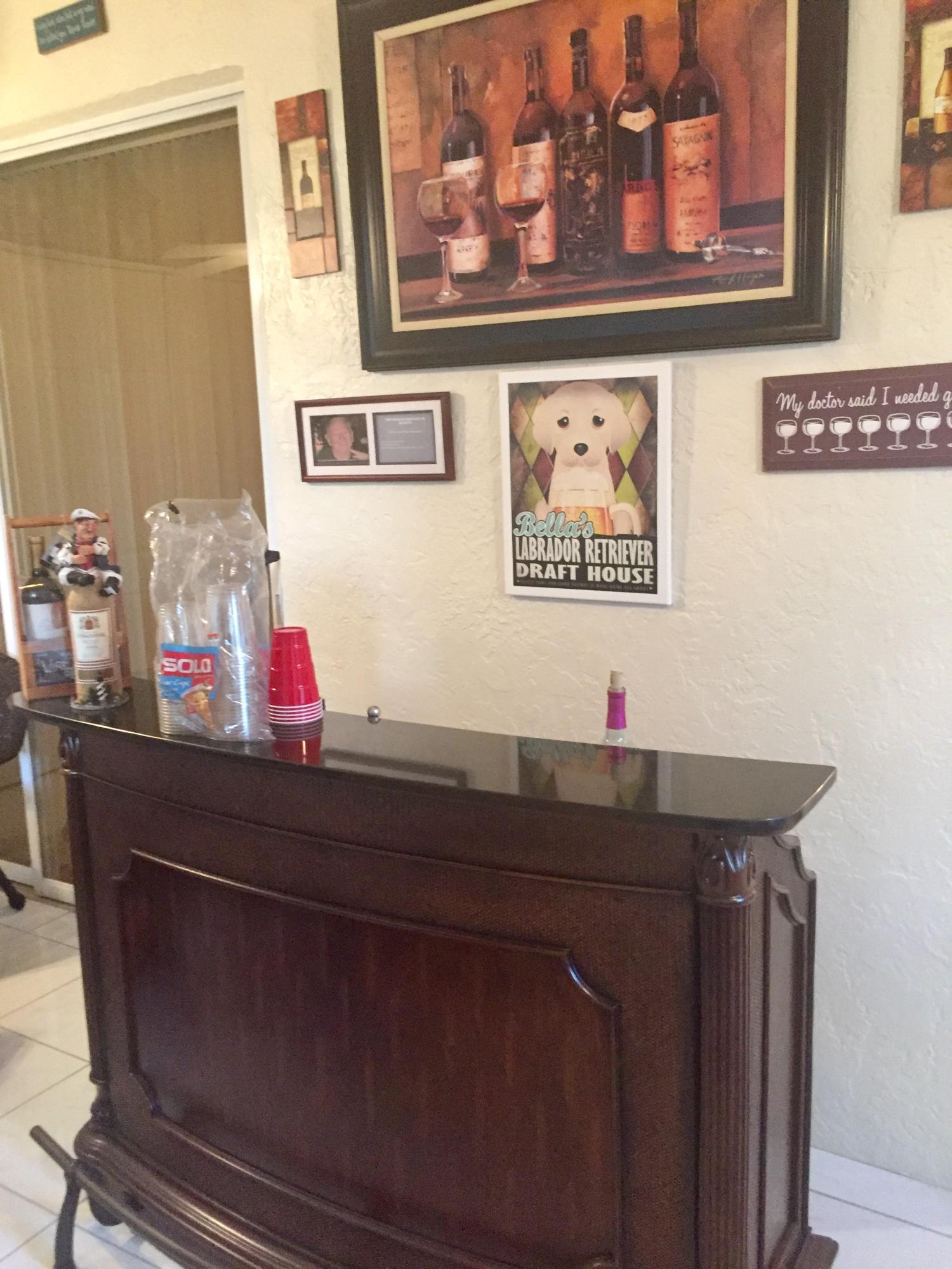 8349 Horseshoe Bay Road Boynton Beach, FL 33472 - Photo 16 of 20 a bathroom with a sink and a mirror