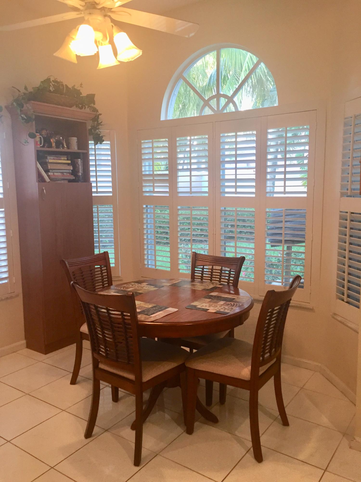 8349 Horseshoe Bay Road Boynton Beach, FL 33472 - Photo 4 of 20 a dining room with furniture and window