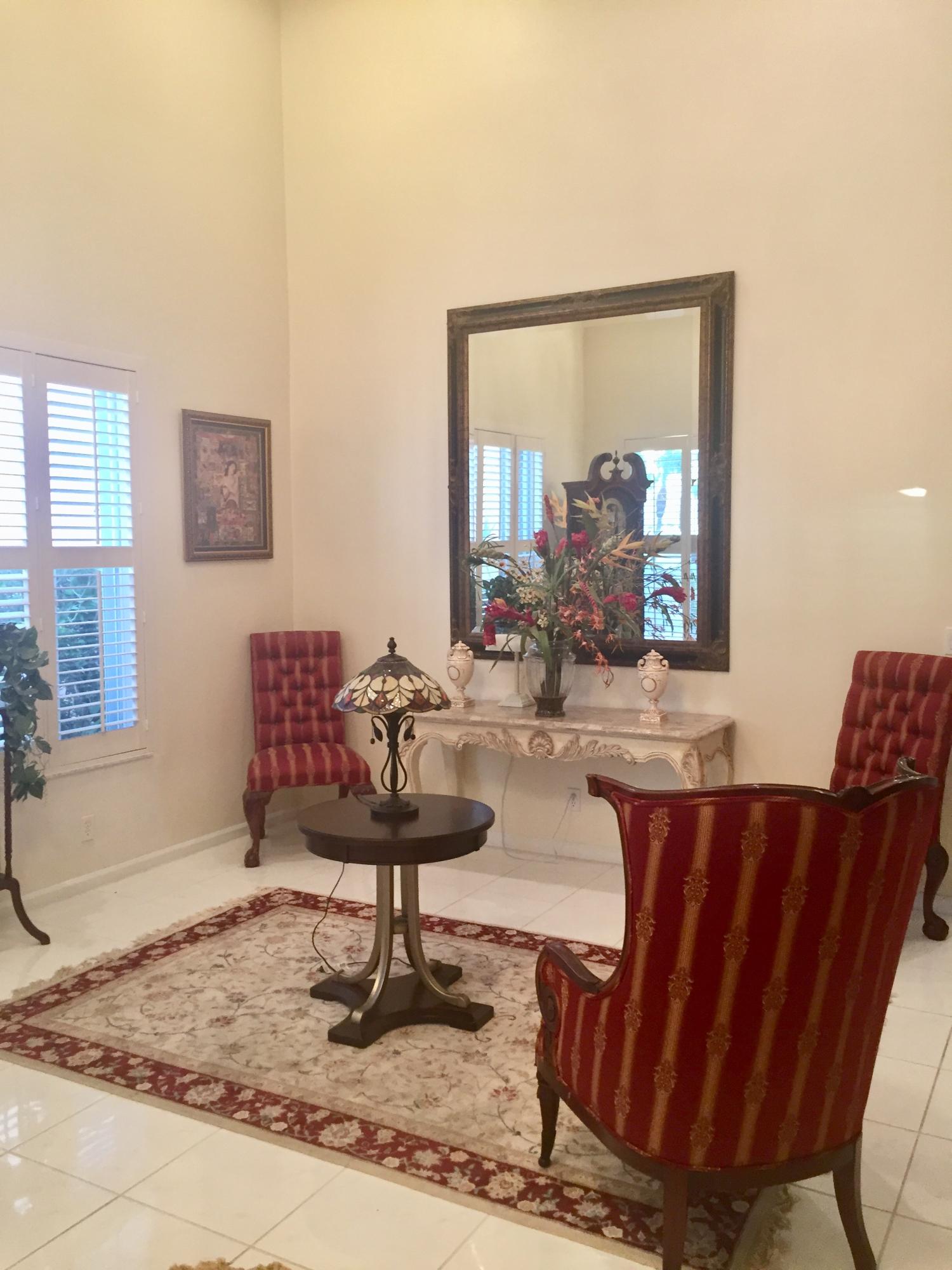 8349 Horseshoe Bay Road Boynton Beach, FL 33472 - Photo 5 of 20 a living room with furniture and a potted plant