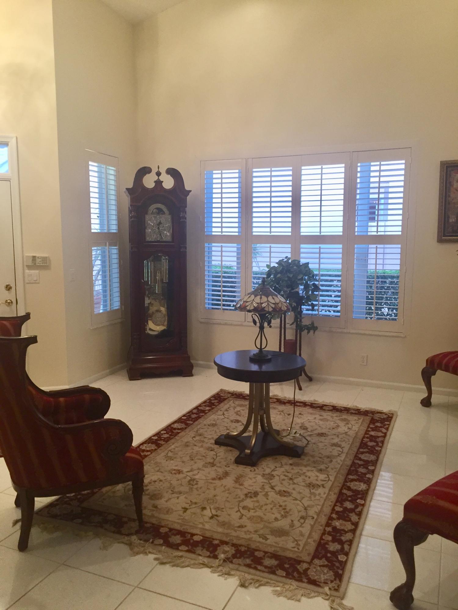 8349 Horseshoe Bay Road Boynton Beach, FL 33472 - Photo 6 of 20 a living room with furniture and a rug