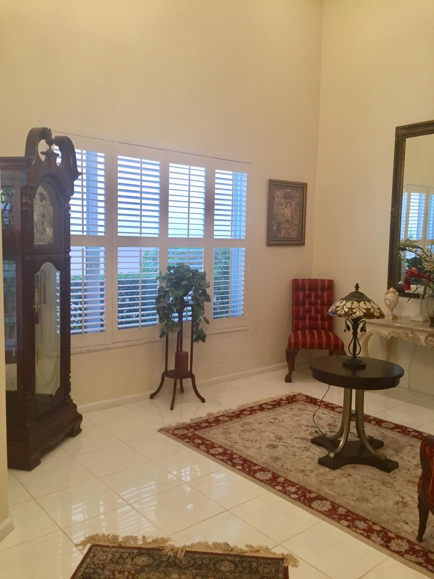 8349 Horseshoe Bay Road Boynton Beach, FL 33472 - Photo 7 of 20 a room with furniture and a window