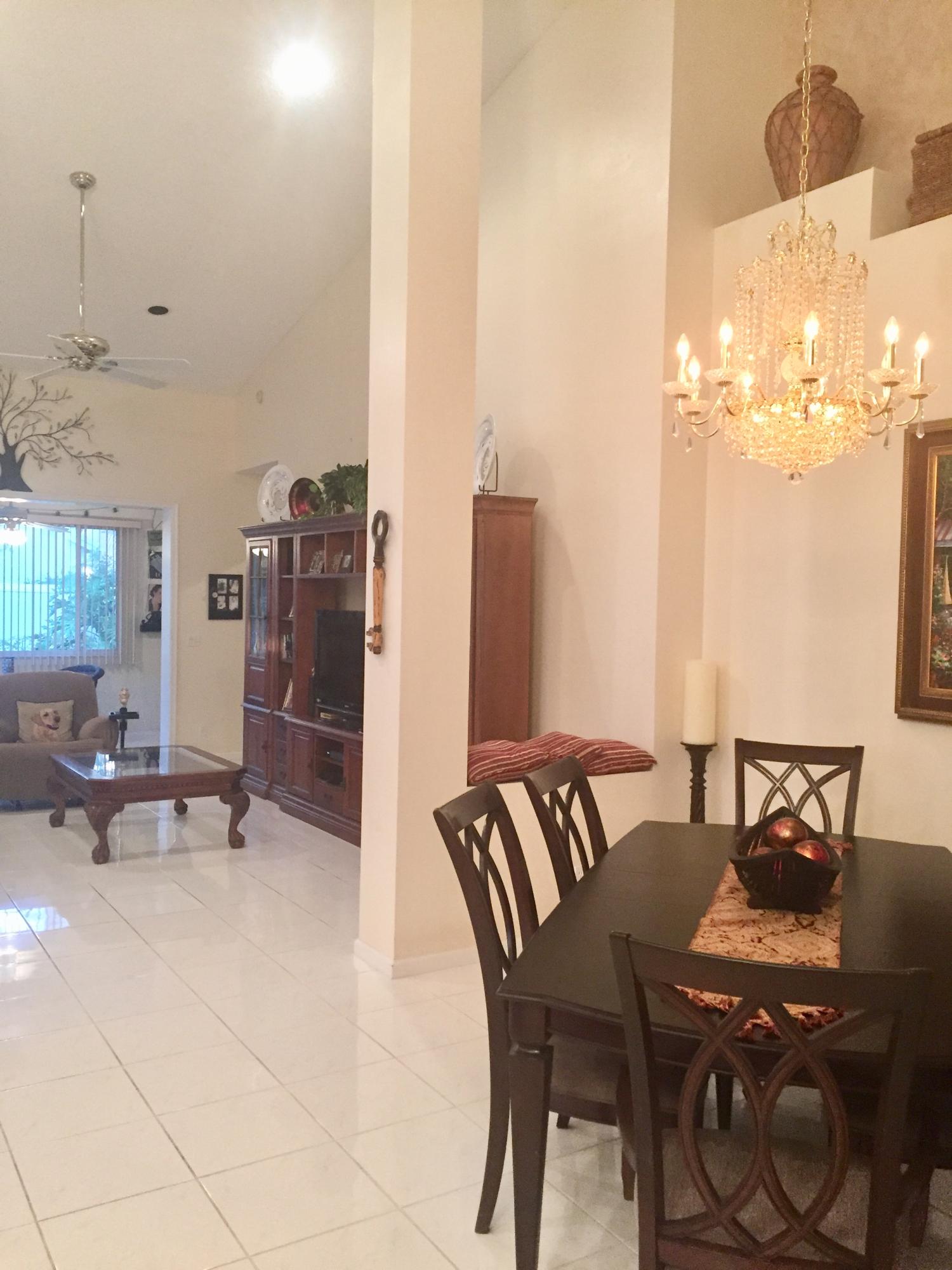 8349 Horseshoe Bay Road Boynton Beach, FL 33472 - Photo 9 of 20 a view of a dining room with furniture