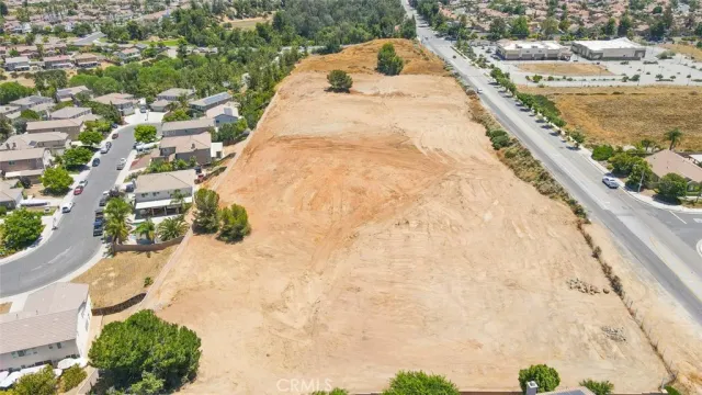a view of a swimming pool with a yard
