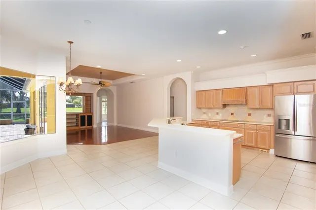 a bathroom with a sink toilet vanity and shower