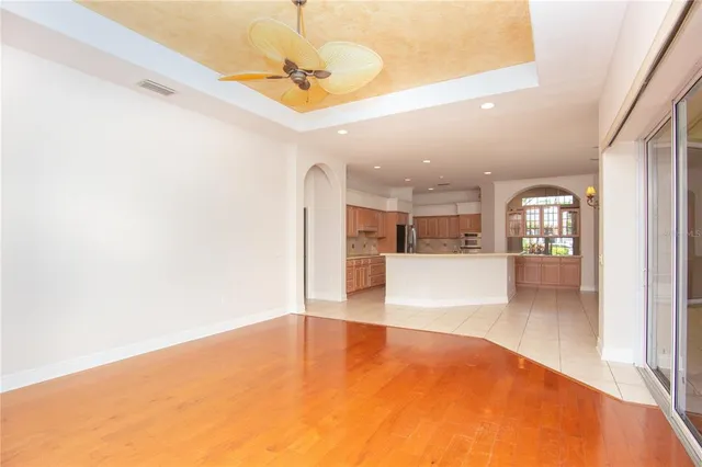 a view of a brick house with a large window