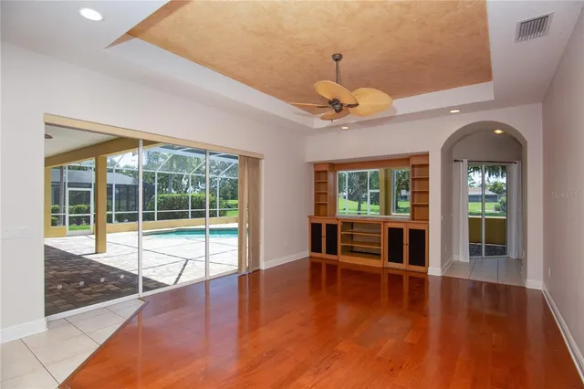 a view of a swimming pool with a porch