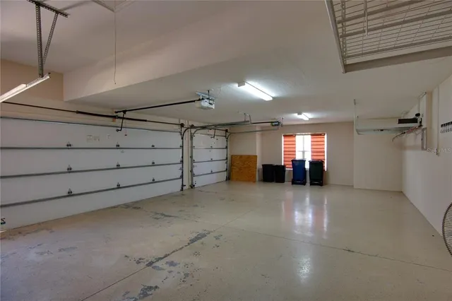 an aerial view of house with yard