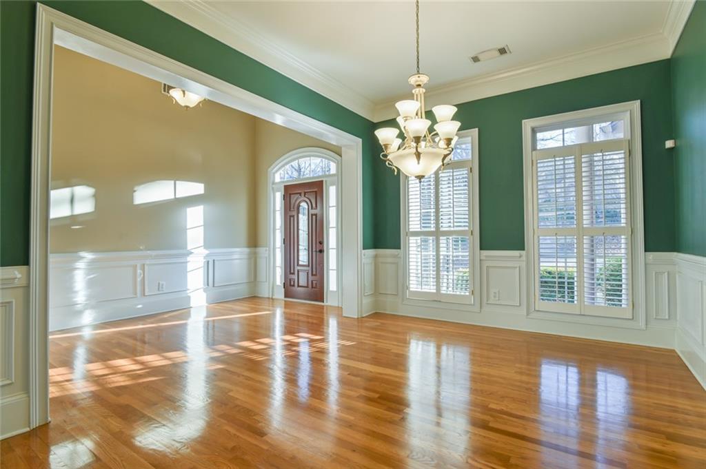 55 Glengarry Chase Covington, GA 30014 - Photo 20 of 73 a view of a room with wooden floor and fan