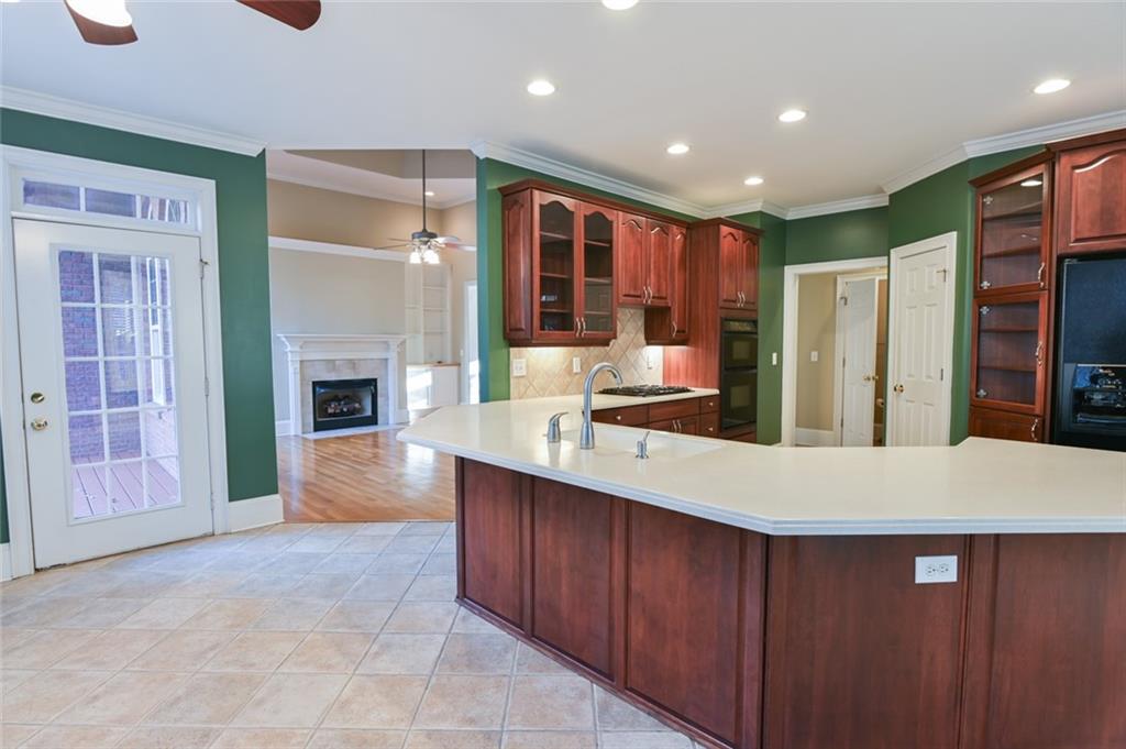 55 Glengarry Chase Covington, GA 30014 - Photo 22 of 73 a large kitchen with stainless steel appliances a large counter top