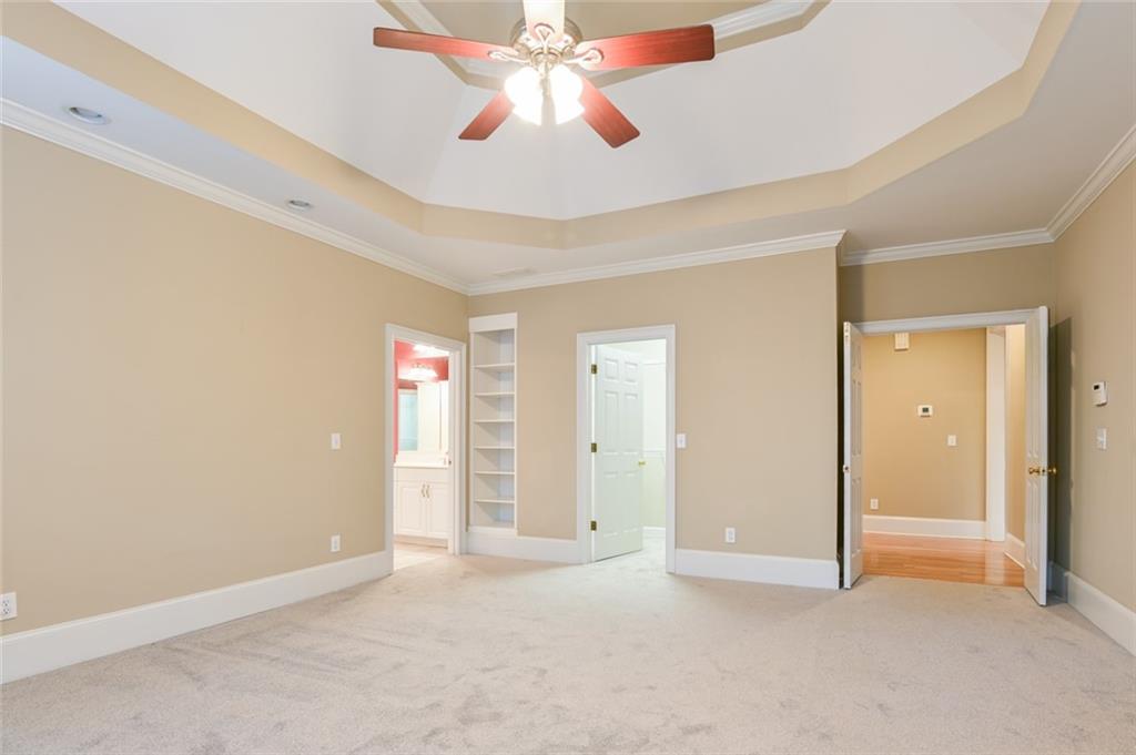55 Glengarry Chase Covington, GA 30014 - Photo 38 of 73 an empty room with chandelier fan