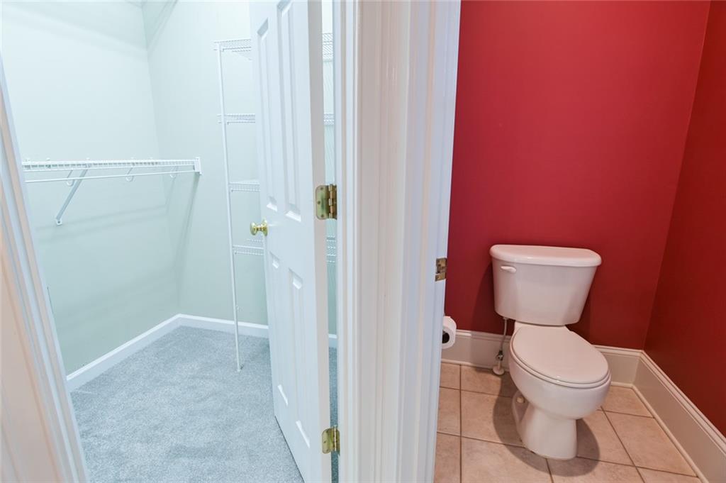 55 Glengarry Chase Covington, GA 30014 - Photo 44 of 73 a bathroom with a toilet and a shower