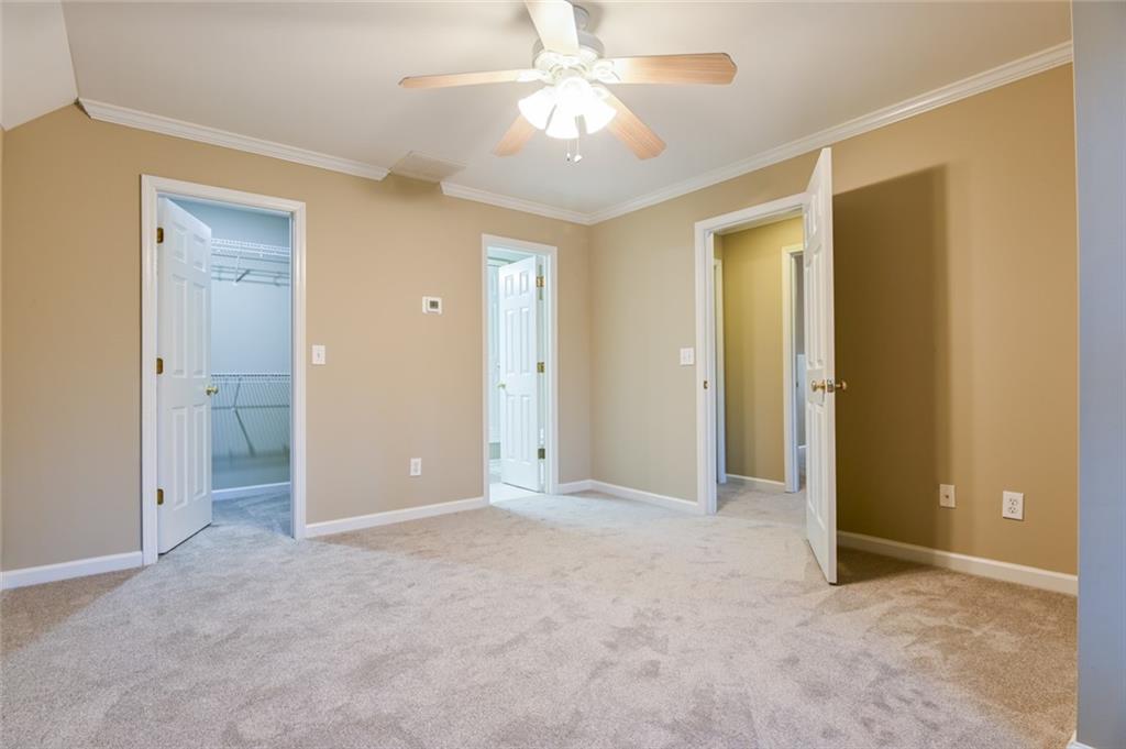 55 Glengarry Chase Covington, GA 30014 - Photo 46 of 73 an empty room with closet and a bathroom