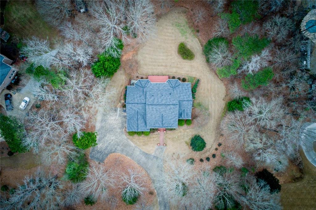 55 Glengarry Chase Covington, GA 30014 - Photo 5 of 73 an aerial view of a backyard with garden