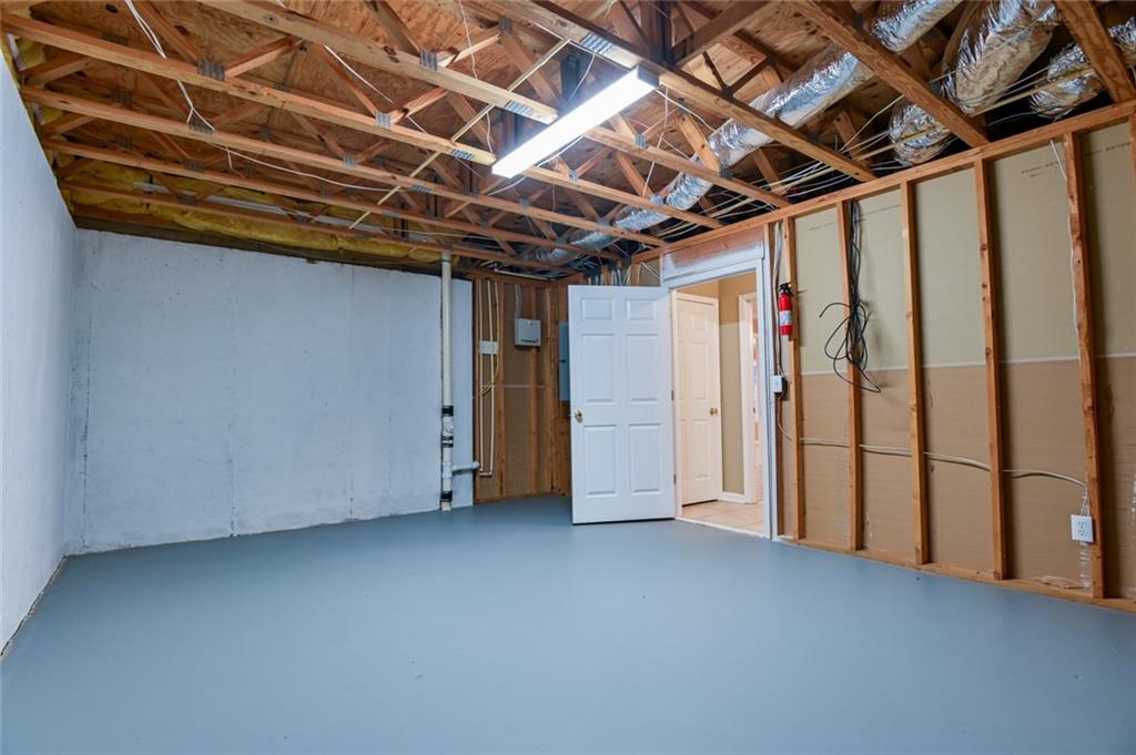 55 Glengarry Chase Covington, GA 30014 - Photo 57 of 73 a view of empty room with wooden walls