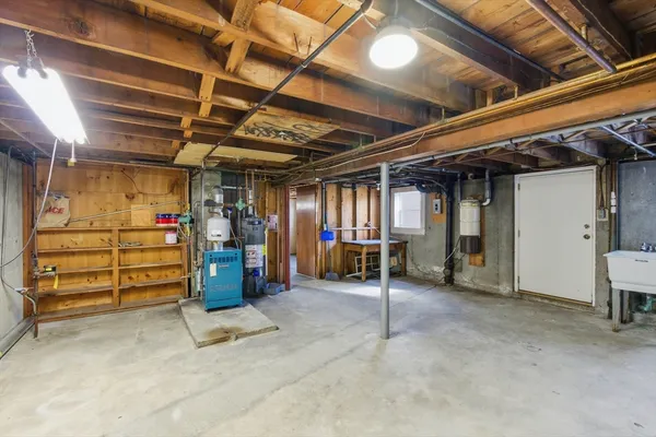 a view of a room with wooden ceiling