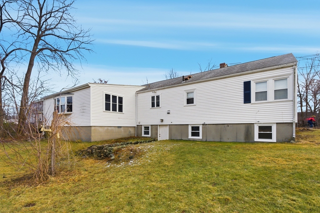 198 Conant Street Danvers, MA 01923 - Photo 28 of 32 a front view of a house with a yard