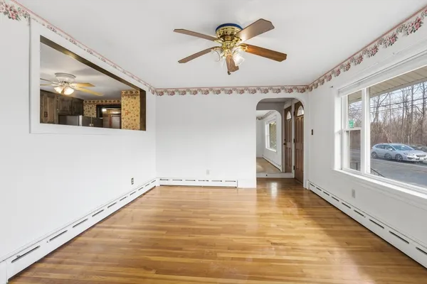a view of an empty room with a window