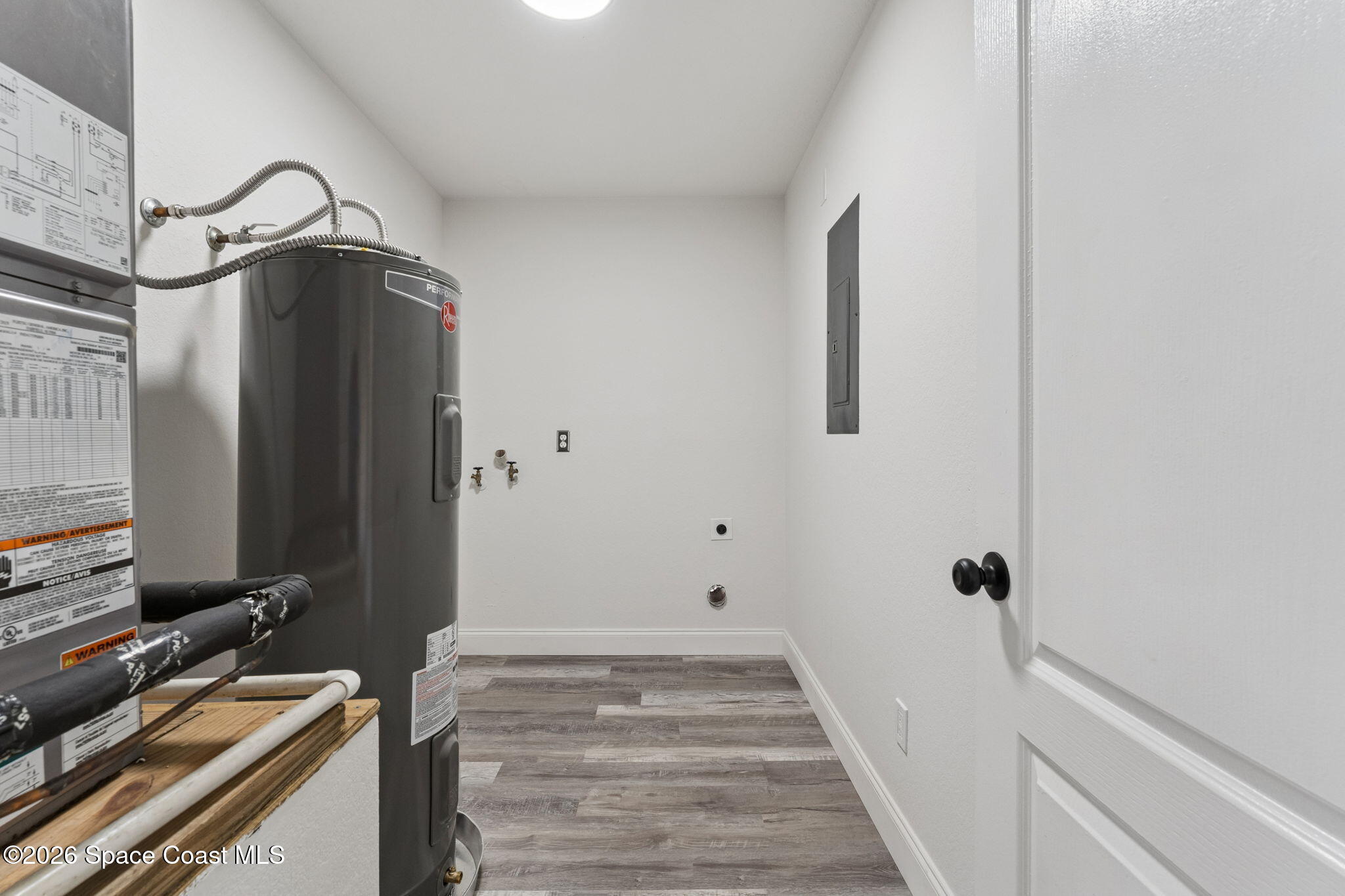 2665 Myrtle Avenue Mims, FL 32754 - Photo 18 of 23 a bathroom with a sink and a mirror