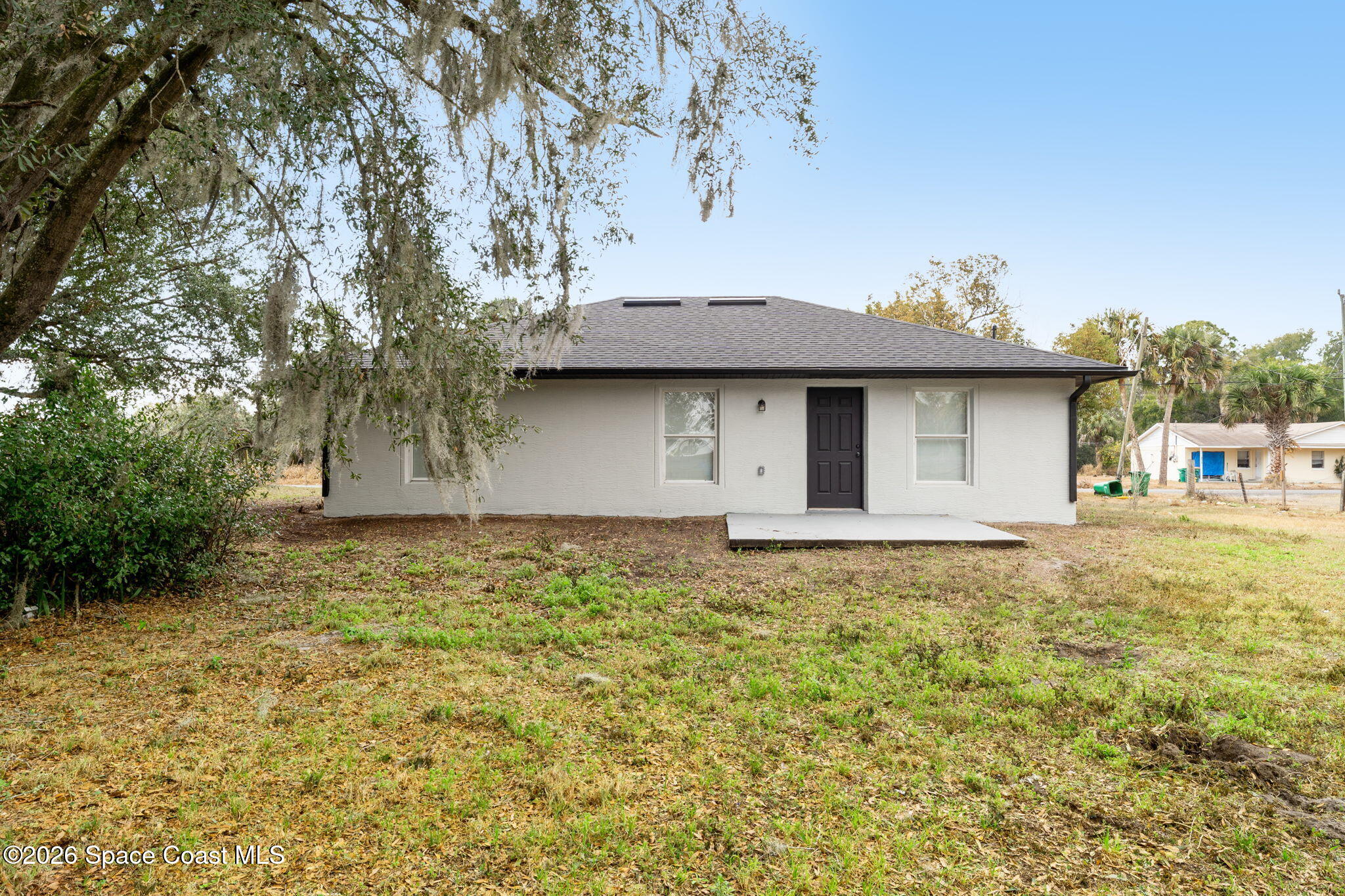 2665 Myrtle Avenue Mims, FL 32754 - Photo 19 of 23 a house view with a garden space