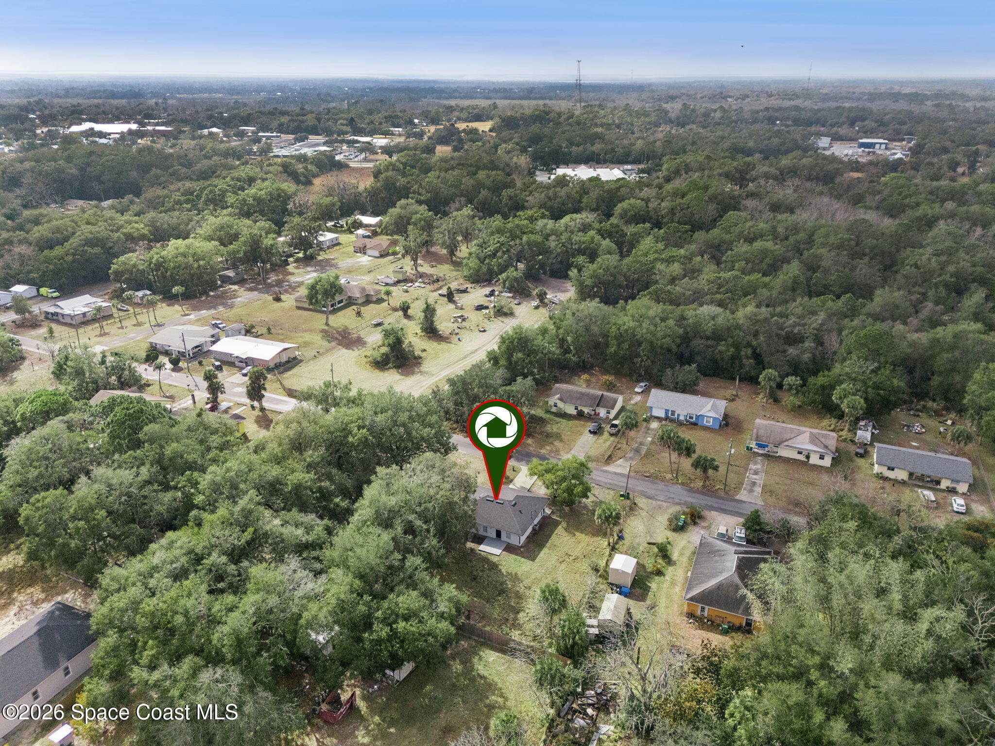 2665 Myrtle Avenue Mims, FL 32754 - Photo 23 of 23 an aerial view of a city with lots of residential buildings