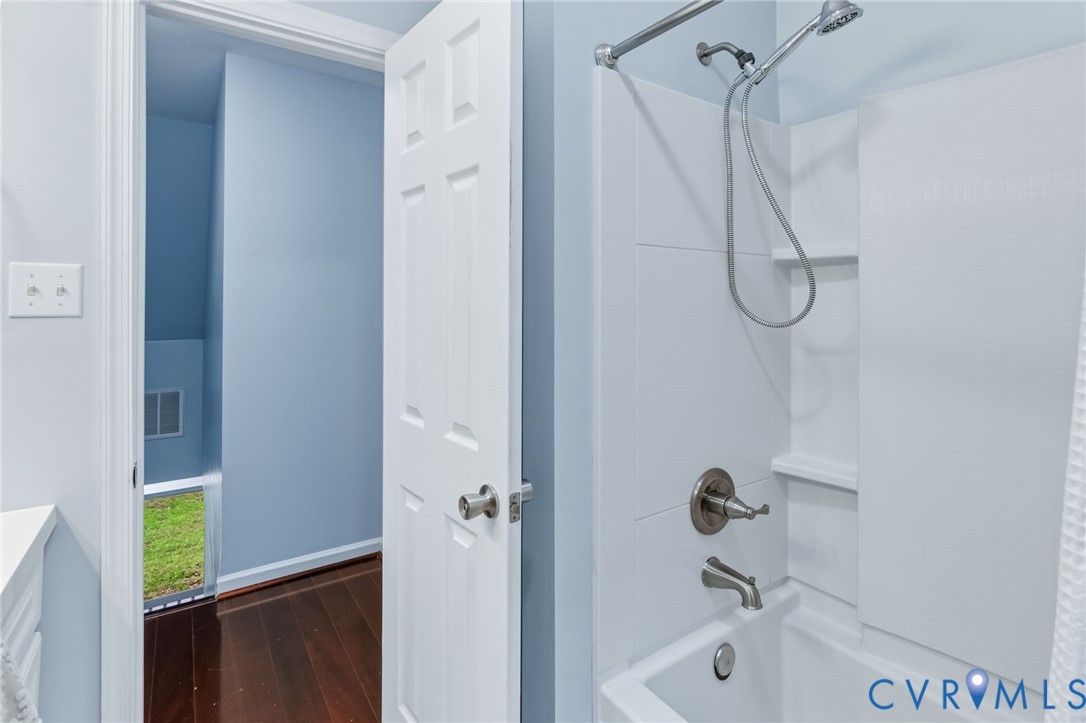 2869 Newville Road Disputanta, VA 23842 - Photo 24 of 26 Bathtub with a shower fixture, textured white show