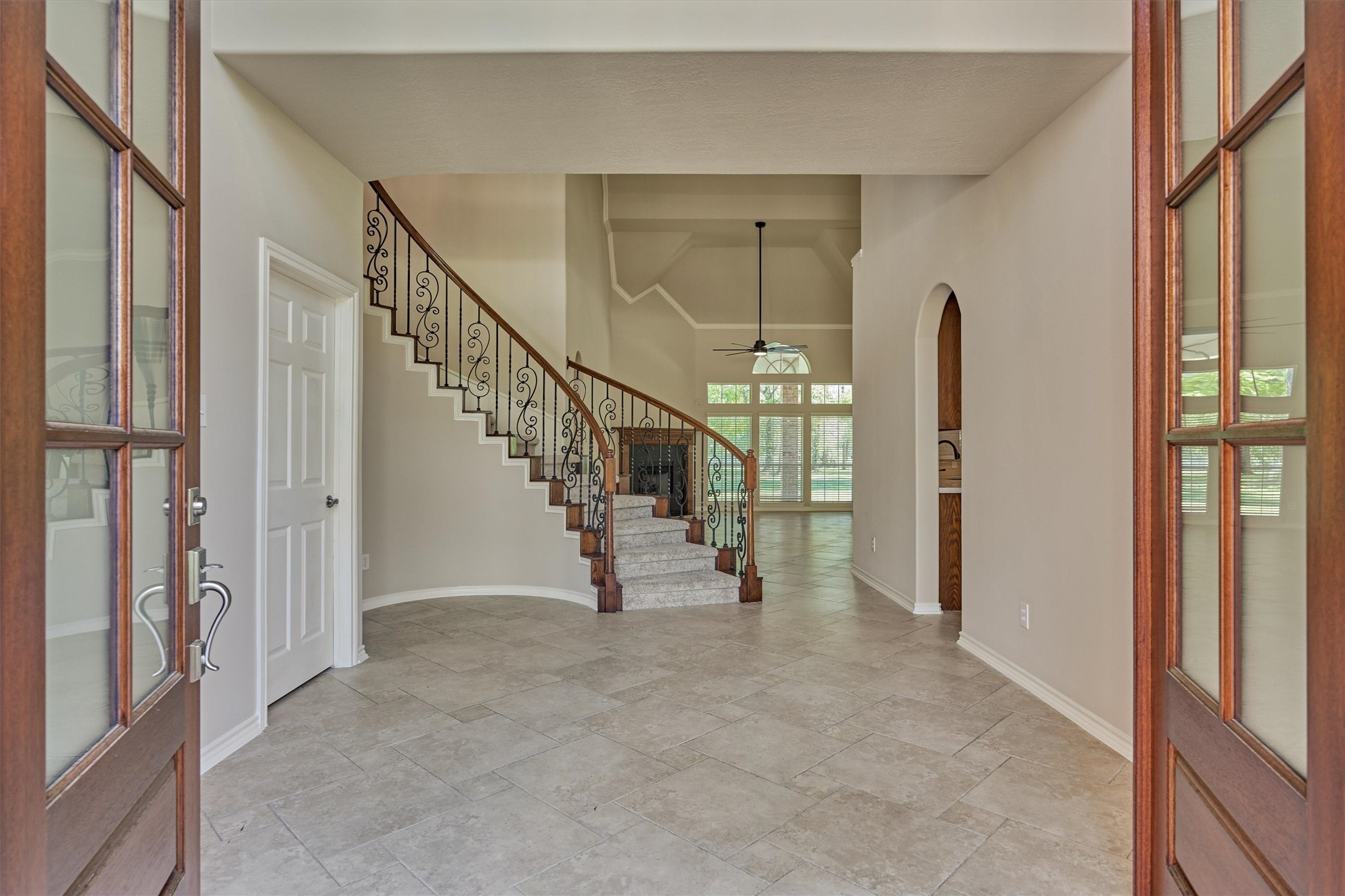 30202 West Legends Trail Drive Spring, TX 77386 - Photo 11 of 50 WOW! The beautiful grand entry into the home.The home has neutral travertine flooring, fresh paint and shows impeccably throughout.