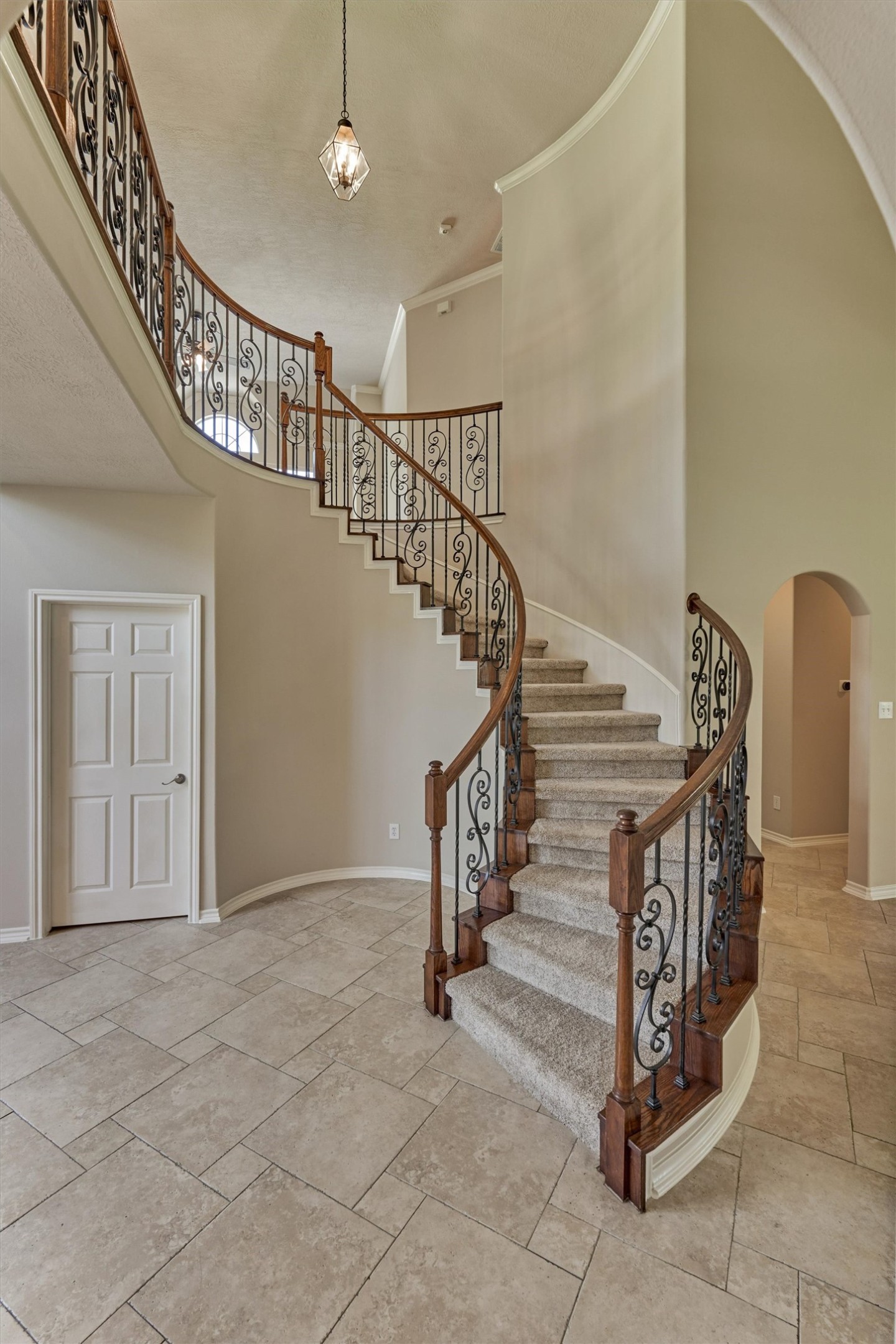 30202 West Legends Trail Drive Spring, TX 77386 - Photo 12 of 50 The stunning wrought Iron staircase. This is such an elegant feature of the home. All new carpey, fresh paint, recently updated fans and hardware.