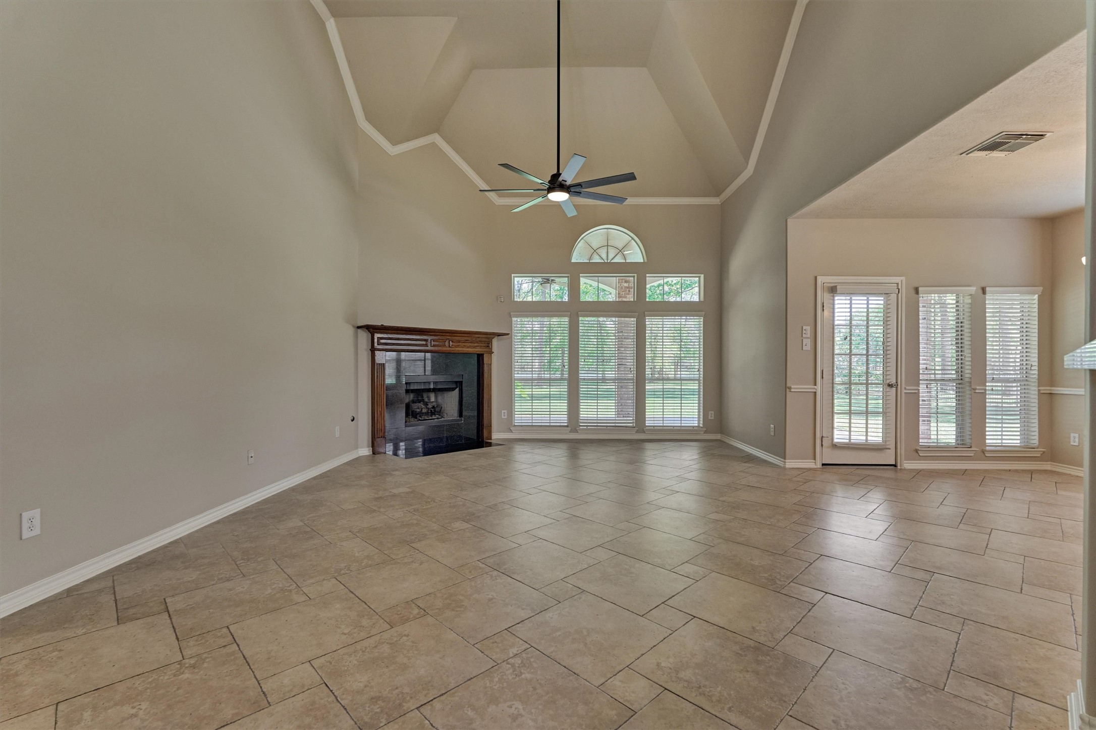 30202 West Legends Trail Drive Spring, TX 77386 - Photo 17 of 50 Another view of the large family room. There are lots of windows in the home allowing lots of natural light in. The home has recently been freshly painted in a neutral tone.