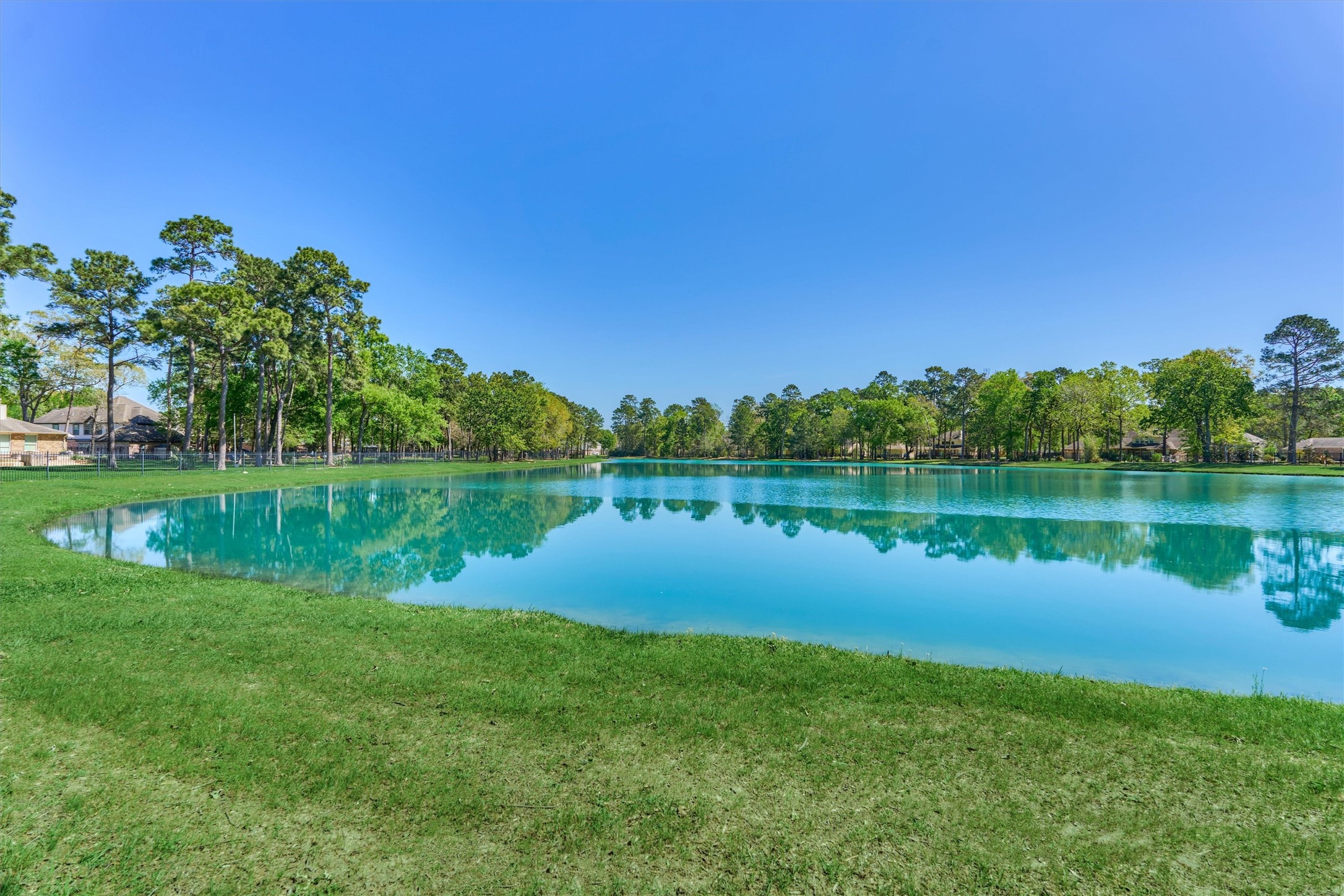 30202 West Legends Trail Drive Spring, TX 77386 - Photo 46 of 50 The neighborhood lake has the most stunning morning and evening views. What a great daily walk this could be...
