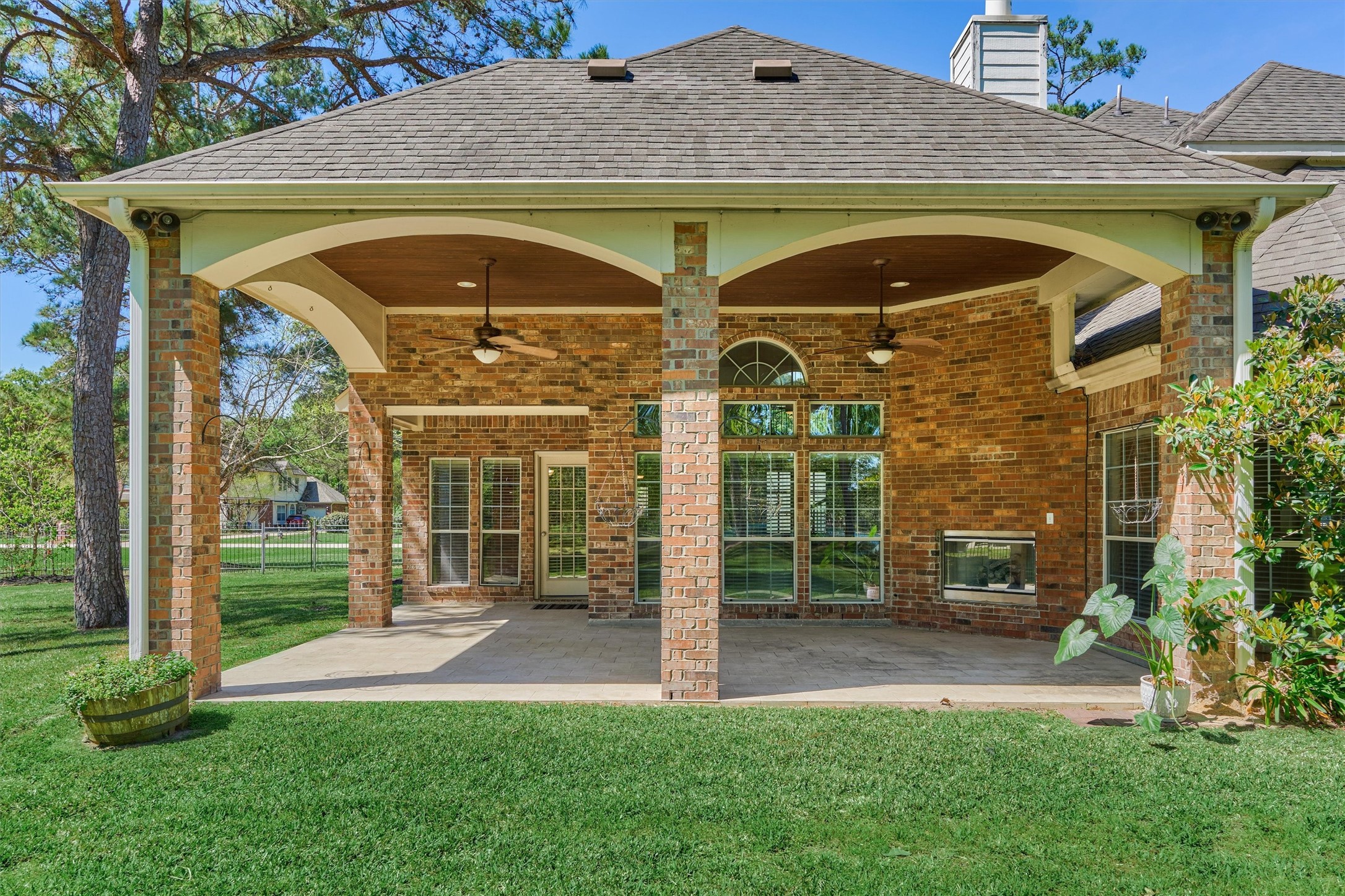 30202 West Legends Trail Drive Spring, TX 77386 - Photo 47 of 50 If you like to entertain or dine outside, then this is the home for you! The huge, covered lanai spans over 440 sq/ft and is an amazing space! The outdoor gas fireplace will keep you warm on those cooler nights.