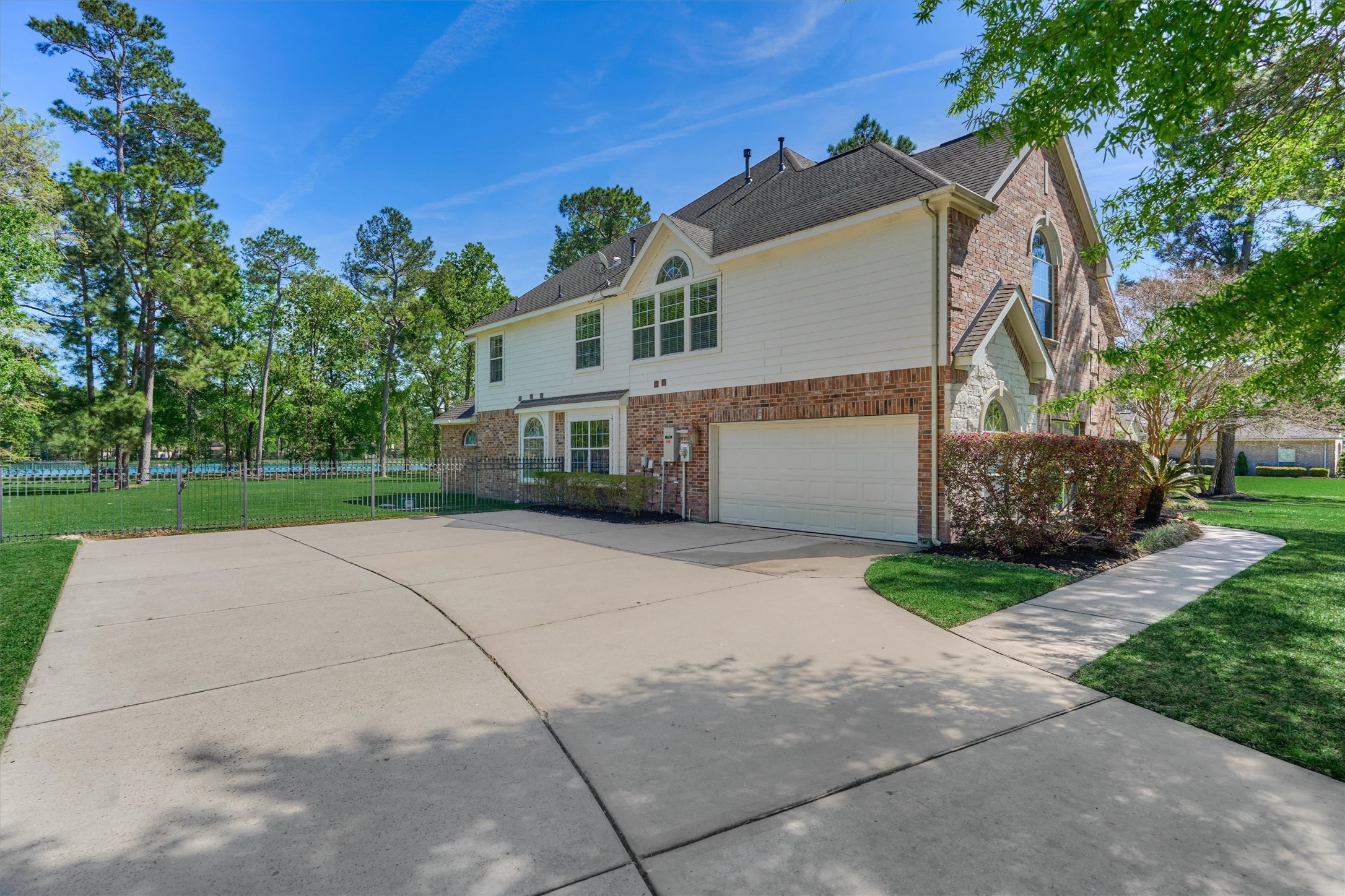 30202 West Legends Trail Drive Spring, TX 77386 - Photo 6 of 50 A view of the large garage space and driveway.