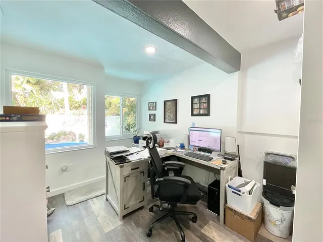a bathroom with a toilet a sink and a mirror
