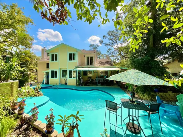 a view of a house with a big yard