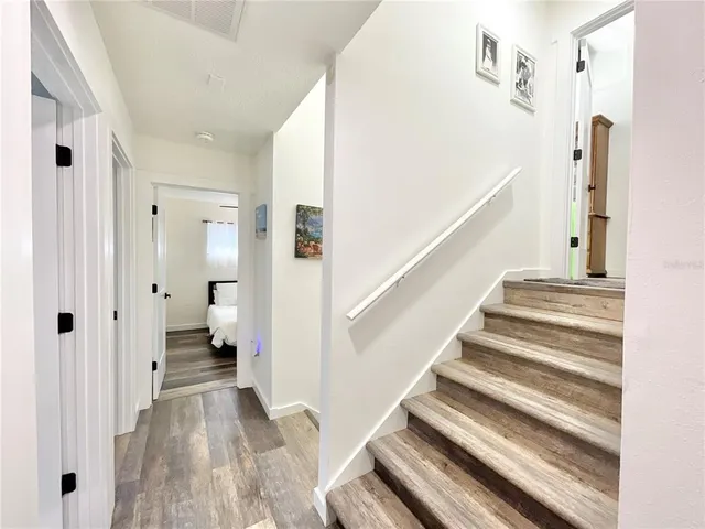 a kitchen with a sink and a large window