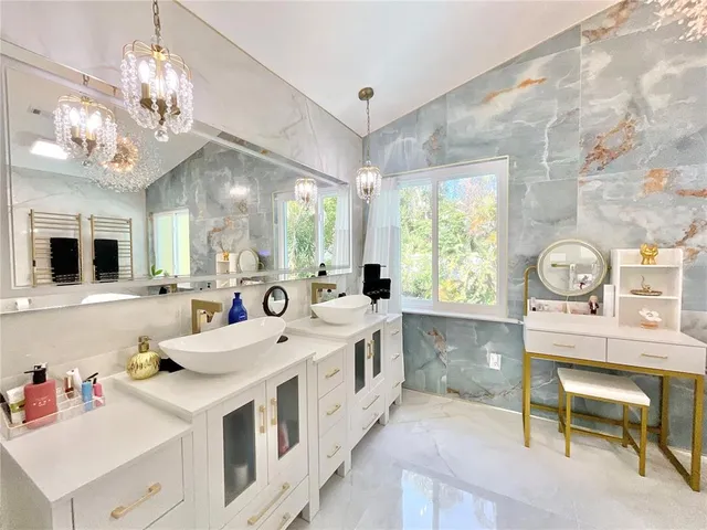 a view of yard with swimming pool and seating