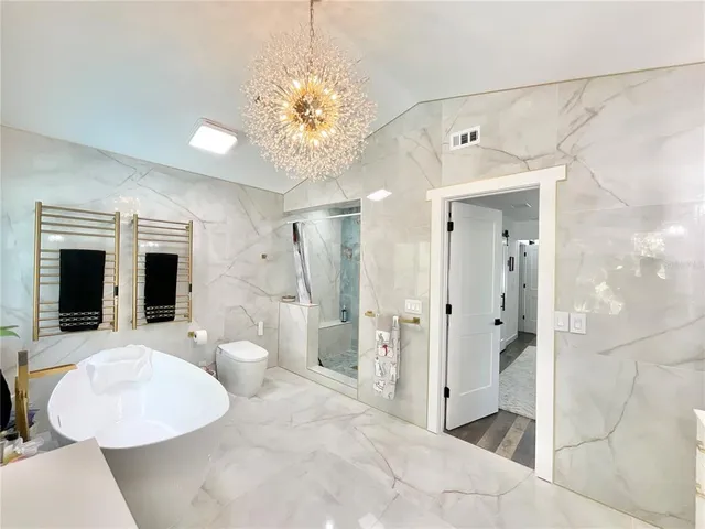 a view of a golf course with chairs